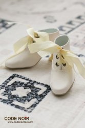 CLS000139 Ivory Ankle Boots